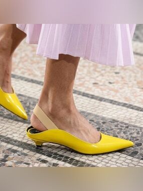 Proenza Schouler wave mules in yellow